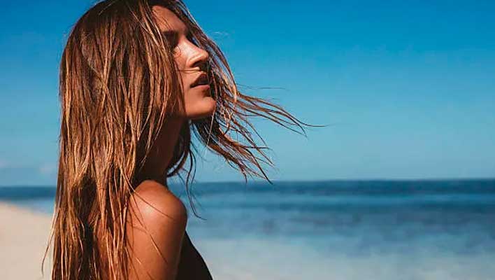 Conseils pour garder vos cheveux en bonne santé à la plage